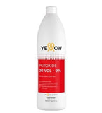 Bottle of Yellow Peroxide 30 Vol - 9% on a white background