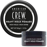 American Crew Heavy Hold Pomade jar and cap on a white background