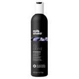 Black shampoo bottle with 'milk shake Icy blond' branding on a white background