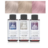 Three bottles of Paul Mitchell hair color with color swatches above on a white background
