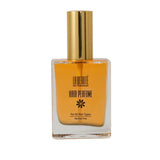 La Beaute Transparent tube with golden liquid on a white background