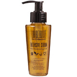 La Beaute Intensive Hair Serum - Transparent bottle with golden serum and black cap on a white background