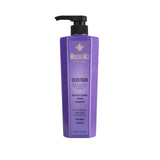 Purple shampoo bottle with pump labeled 'Morena Mia Silver Touch' on a white background