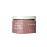 L'ANZA Healing Curls Curl Restore Moisture Treatment bottle on a white background